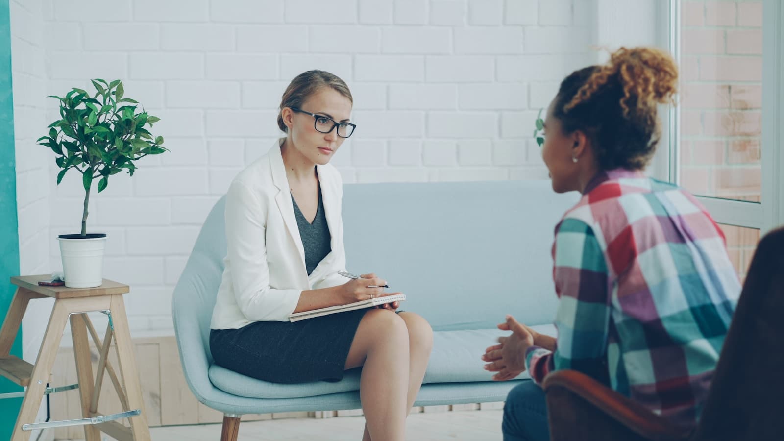 Therapist listening attentively during a counselling session