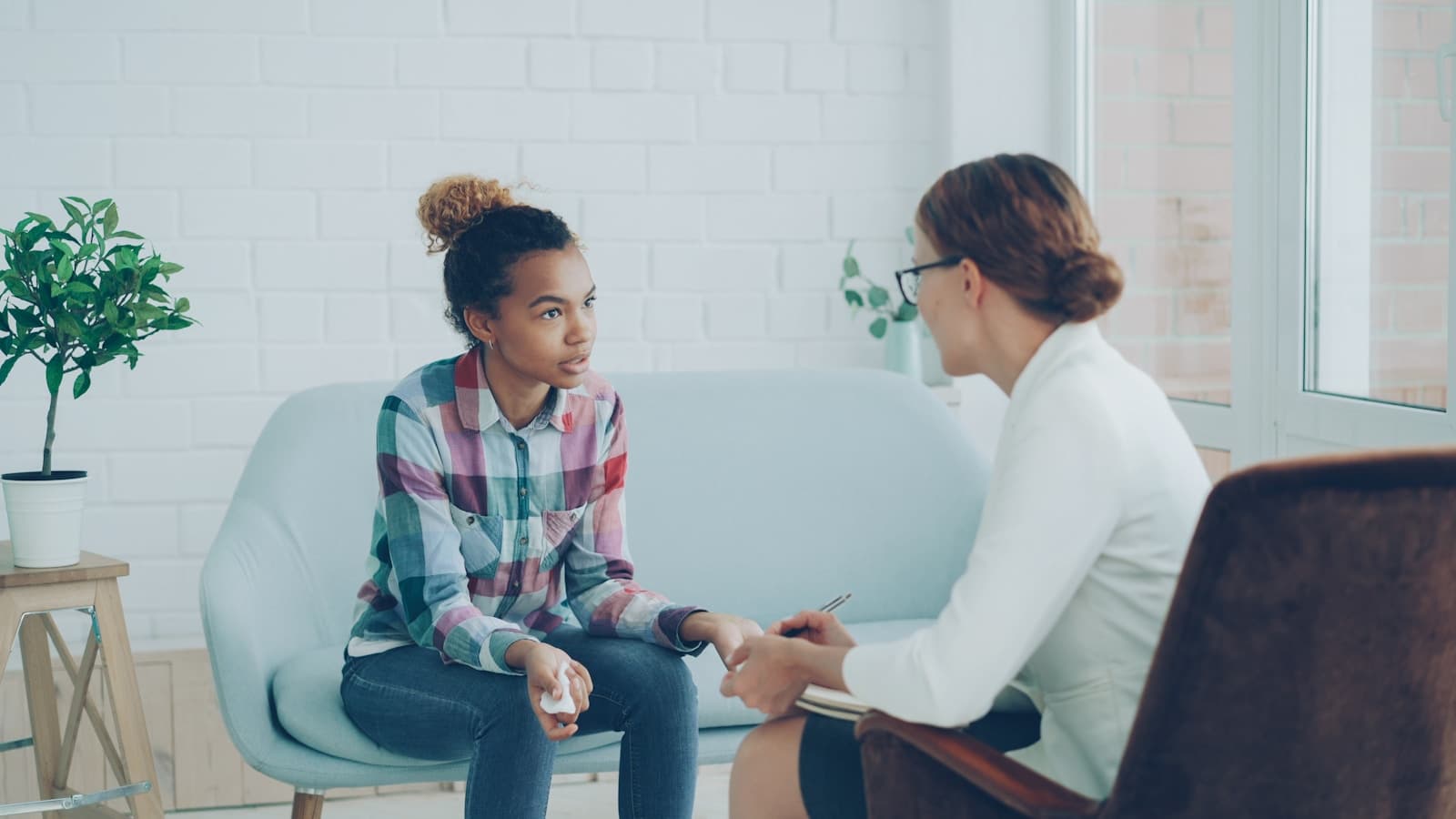 Therapist supporting a person during a counselling session