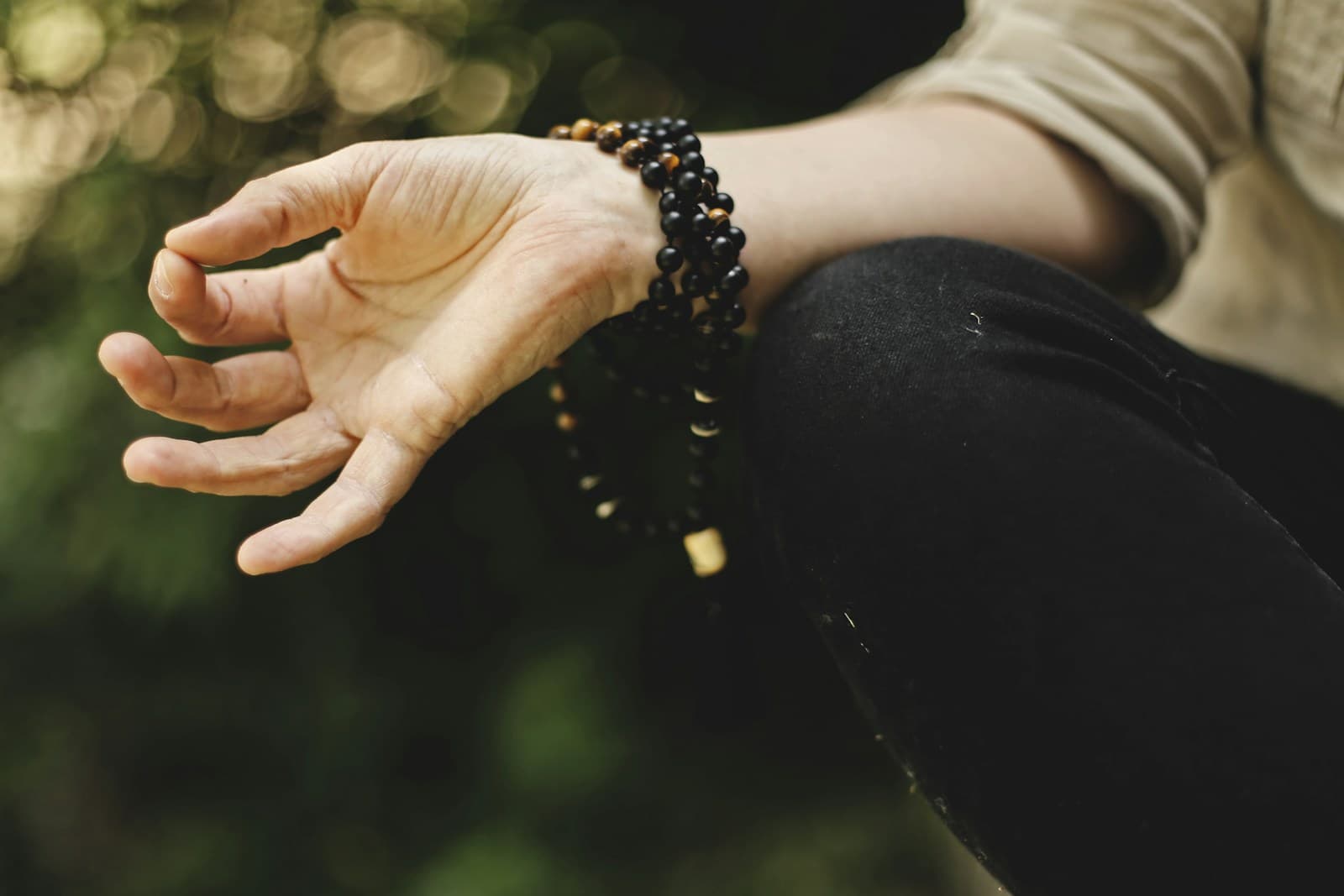 Person practising mindfulness outdoors